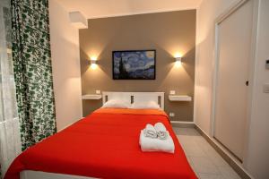 A bed or beds in a room at Living Salerno B&b
