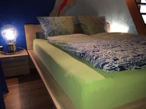 Una cama o camas en una habitación de B&B Stein am Rhein