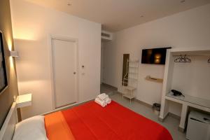 A bed or beds in a room at Living Salerno B&b