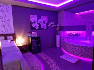 Postel nebo postele na pokoji v ubytování Remissio wellness rooms