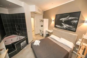 A bed or beds in a room at Living Salerno B&b