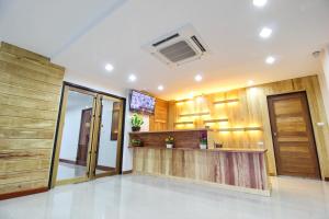 Kuchyň nebo kuchyňský kout v ubytování Tai-Shan Suites