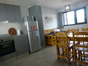 Kuchyň nebo kuchyňský kout v ubytování Departamento RUKA-9