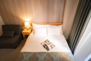 Voodi või voodid majutusasutuse 谷町君Hotel 京都駅東29 toas