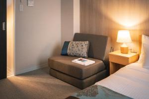 Voodi või voodid majutusasutuse 谷町君Hotel 京都駅東29 toas