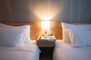 Voodi või voodid majutusasutuse 谷町君Hotel 京都駅東29 toas