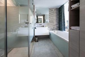 Кровать или кровати в номере Hotel Arupinum