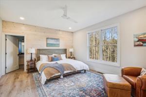 a bedroom with a bed and a window at Hill House in Waterbury
