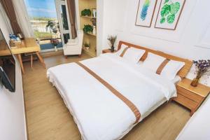 Dali Listening Seaview Villa大理听城海景别墅客房内的一张或多张床位