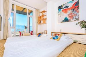 Dali Listening Seaview Villa大理听城海景别墅客房内的一张或多张床位