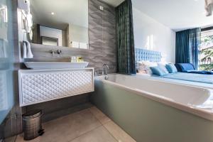 Ванная комната в Hotel Arupinum
