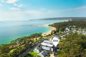 an aerial view of a beach with condos at Splash by Experience Jervis Bay in Huskisson