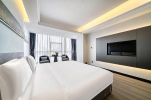 Televisyen dan/atau pusat hiburan di Yiwu International Mansion