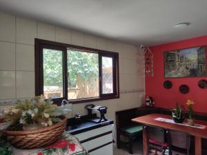 Η κουζίνα ή μικρή κουζίνα στο Casa toda 400m da praia