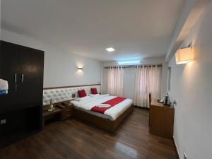 Letto o letti in una camera di Sichu Chhen