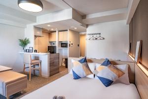 Kuchyň nebo kuchyňský kout v ubytování Apartment Hotel 11 Shinsaibashi 3 + 21 fotografií