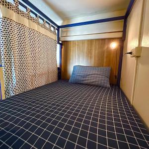 Кровать или кровати в номере Hoft Hostel Bangkok