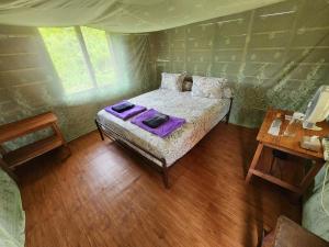 Postel nebo postele na pokoji v ubytování MB Palambak Island Resort Pulau Banyak Aceh Singkil