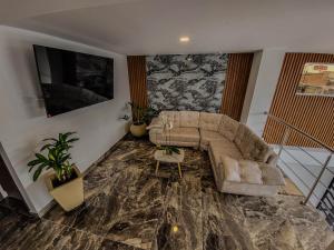 TV a/nebo společenská místnost v ubytování Hotel La Gran Estaciónag
