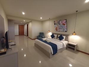 Postel nebo postele na pokoji v ubytování Abian Harmony Hotel