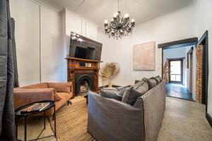 TV a/nebo společenská místnost v ubytování Blacksmith Cottage Aldinga