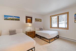 En eller flere senge i et værelse på Riverside Condos C102 by AvantStay Condo Close To Downtown Town Park Ski Lift 8