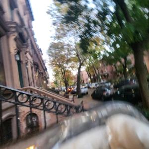 a view of a city street with buildings and cars at New York City Guest House 2 in New York