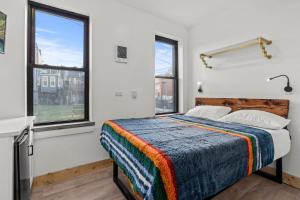 Postel nebo postele na pokoji v ubytování Goodseed Suites Philadephia Center