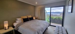 Postel nebo postele na pokoji v ubytování Stockyards 2, Jindabyne
