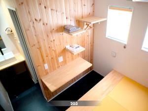 a sauna with wooden walls and shelves in a room at Kita-Kamakura 520ゴーニーマル in Kamakura +55 photos
