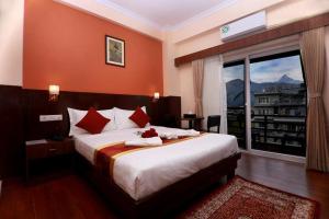 Katil atau katil-katil dalam bilik di Hotel Eco Tree Pokhara