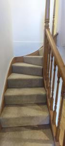 a set of stairs in a home withgraded at Shear Annexe Flat in Cambridge