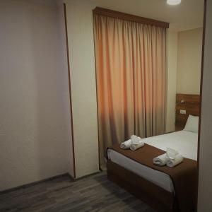 Postelja oz. postelje v sobi nastanitve Hotel Georgian