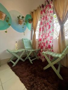 Posezení v ubytování The Divine Abode Homestay 1