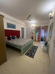 Postel nebo postele na pokoji v ubytování The Divine Abode Homestay 1