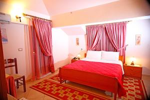 Een bed of bedden in een kamer bij Hotel Primavera