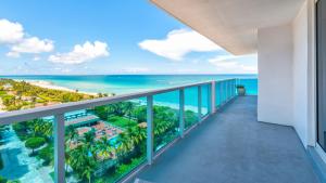 a balcony with a view of the ocean at Oceanfront Private Condo at 1 Hotel & Homes -1019 in Miami Beach