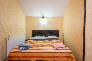 Postel nebo postele na pokoji v ubytování Guesthouse Mtskheta-Kapanadze