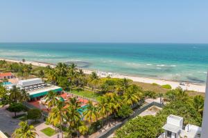 an aerial view of a beach and the ocean at Oceanview Private Condo at 1 Hotel & Homes -915 in Miami Beach