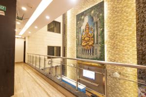 TV a/nebo společenská místnost v ubytování Hotel Gold Souk - Karol Bagh