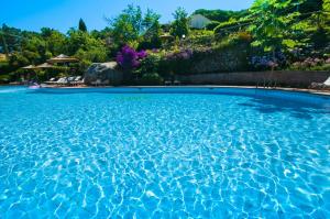 The swimming pool at or close to Hotel Cernia Isola Botanica