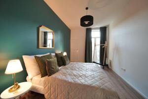 Letto o letti in una camera di Royal Square View Residence