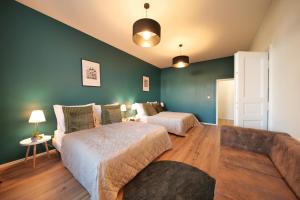 Letto o letti in una camera di Royal Square View Residence