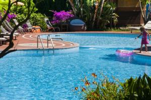 The swimming pool at or close to Hotel Cernia Isola Botanica