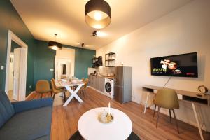 TV o dispositivi per l'intrattenimento presso Royal Square View Residence