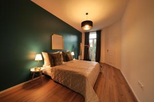 Letto o letti in una camera di Royal Square View Residence