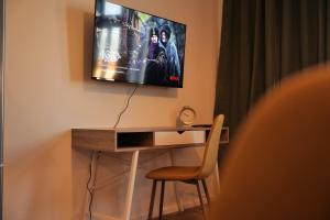 TV o dispositivi per l'intrattenimento presso Royal Square View Residence