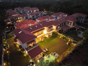 an aerial view of a large house with a yard at Casa Azul- Luxury 4bhk Assagao with private pool in Vagator
