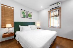 Кровать или кровати в номере 22Land Classic Suites