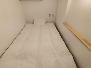 Postel nebo postele na pokoji v ubytování Hostel Belle Via Tokyo